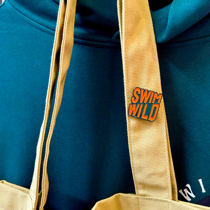 Swim Wild pin badge